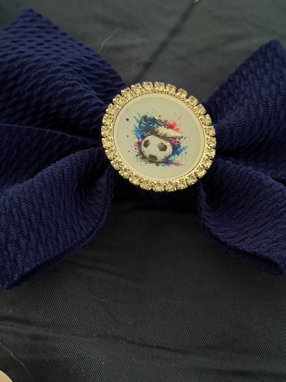 Gold-Embellished Navy Bow Hair Clip with Soccer Accent